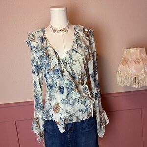fairy babydoll y2k boho ruffle flare floral blouse

violet and claire
sz small